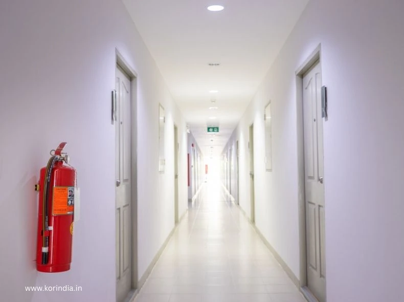 Visual showing certified fire rated doors from KOR India in residential apartments, commercial office complexes, and industrial warehouses across India